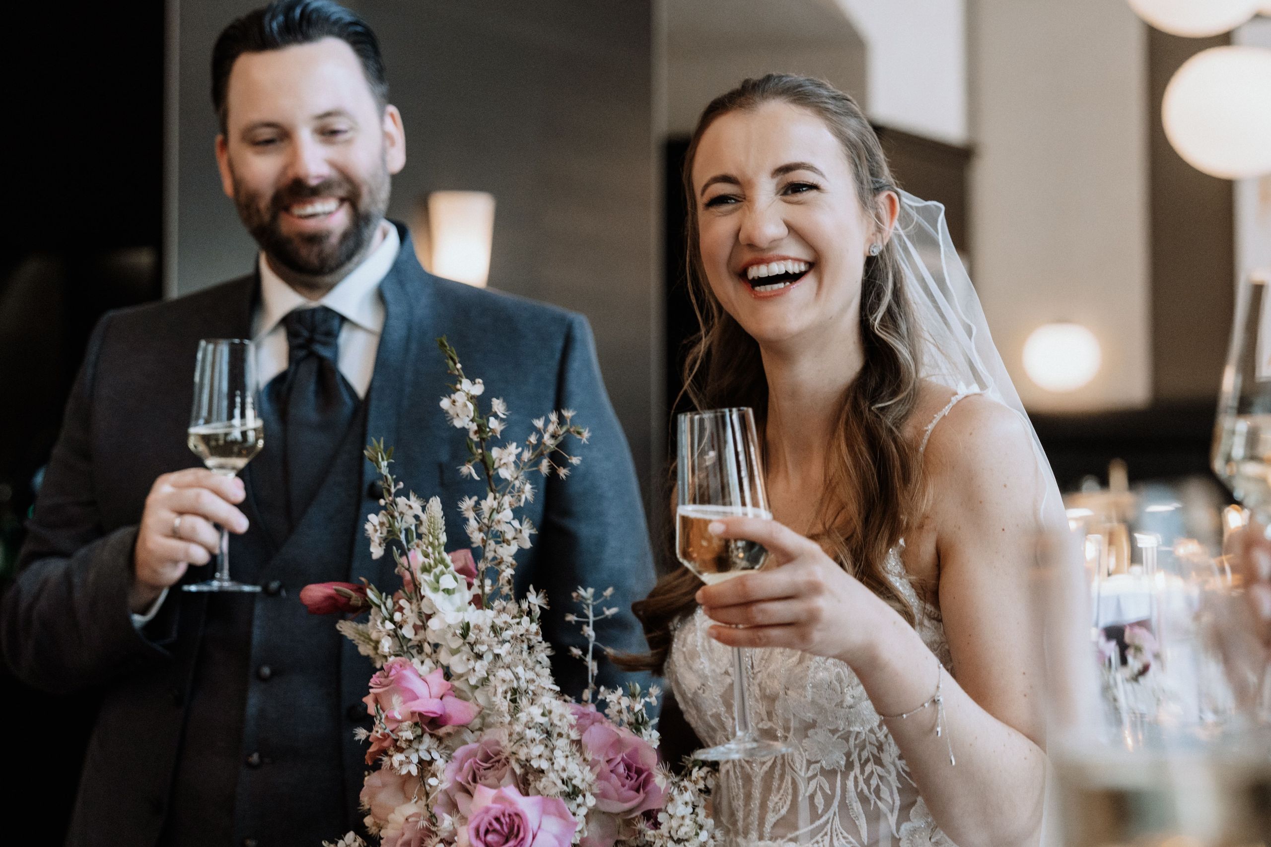 Newlyweds at wedding reception at Leipzig Icon Grandhotel Handelshof